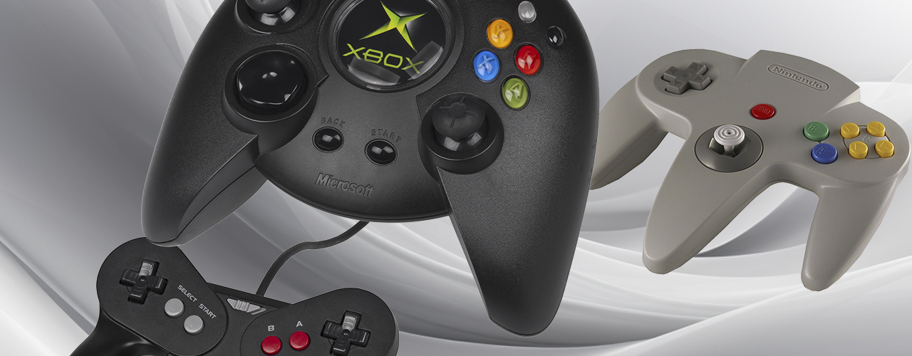 Image of three controllers against a gray background